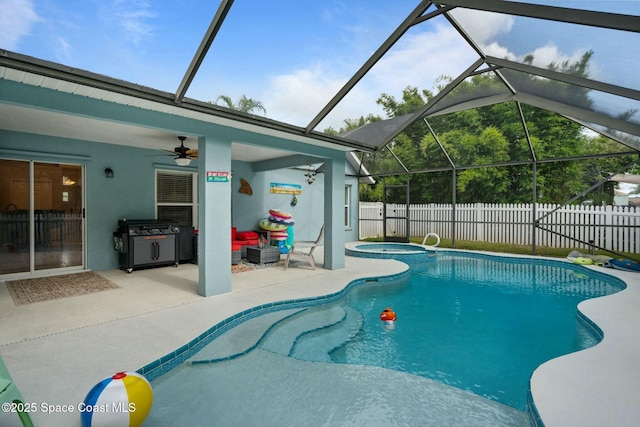 view of swimming pool featuring ceiling fan, a lanai, grilling area, a patio area, and an in ground hot tub