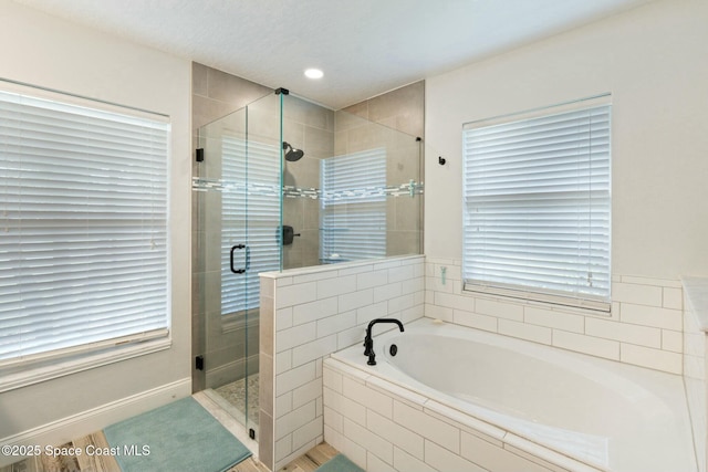 bathroom with independent shower and bath