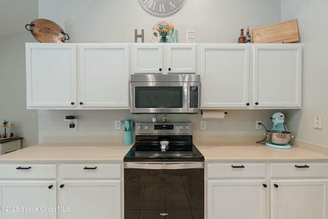 kitchen with white cabinets and stainless steel appliances