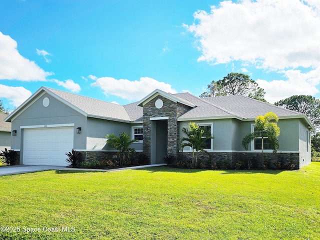 single story home featuring a front lawn and a garage