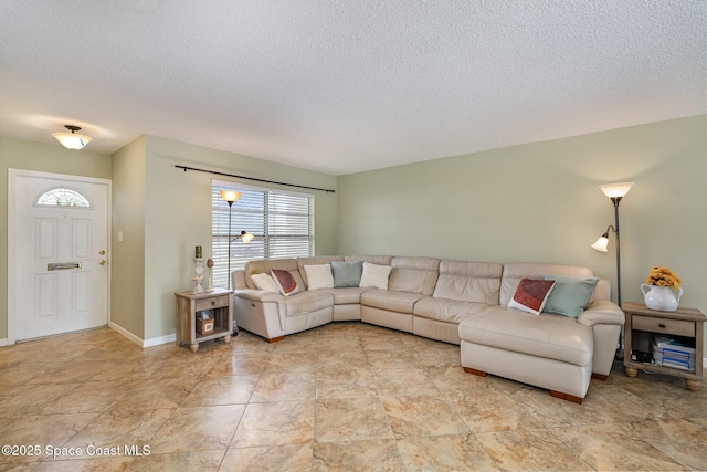 living room with a textured ceiling