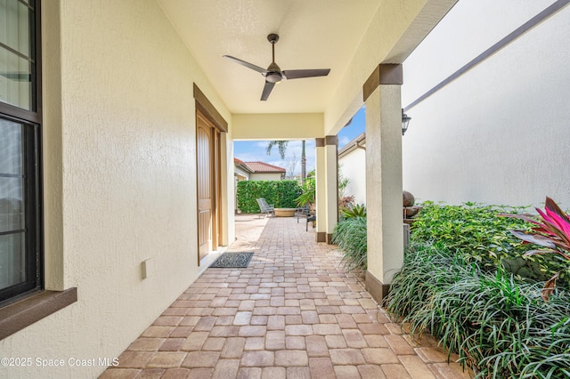 view of patio with ceiling fan