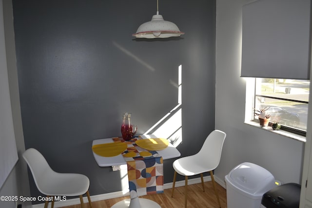 dining room with hardwood / wood-style floors