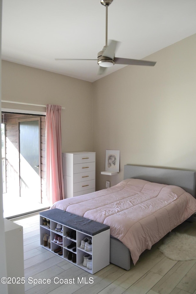 bedroom with hardwood / wood-style floors and ceiling fan