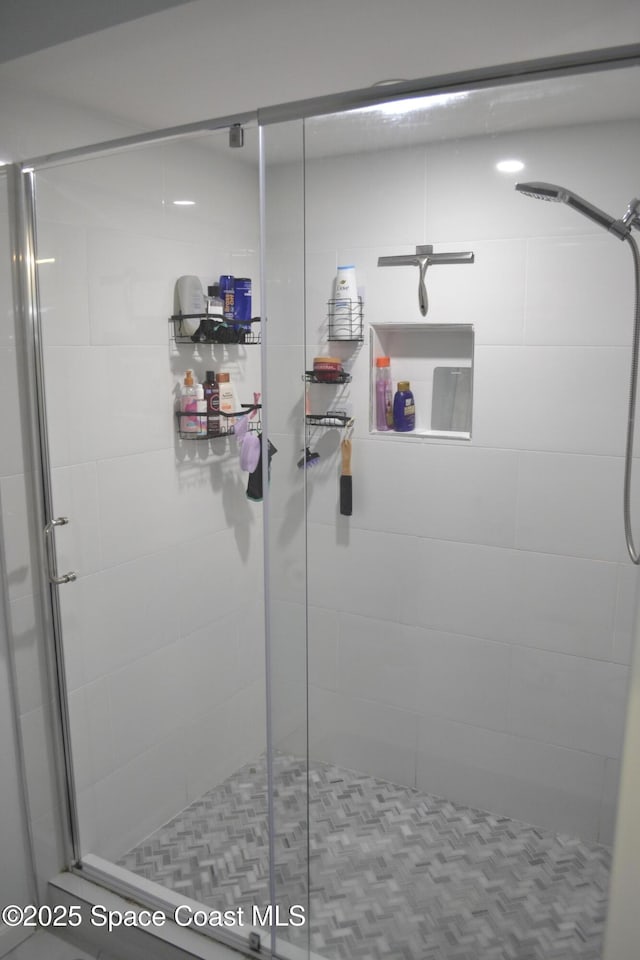 bathroom featuring walk in shower