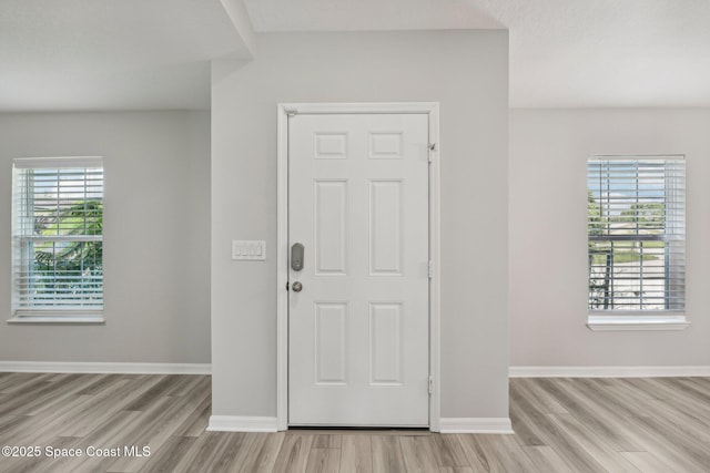 entryway with light wood-type flooring