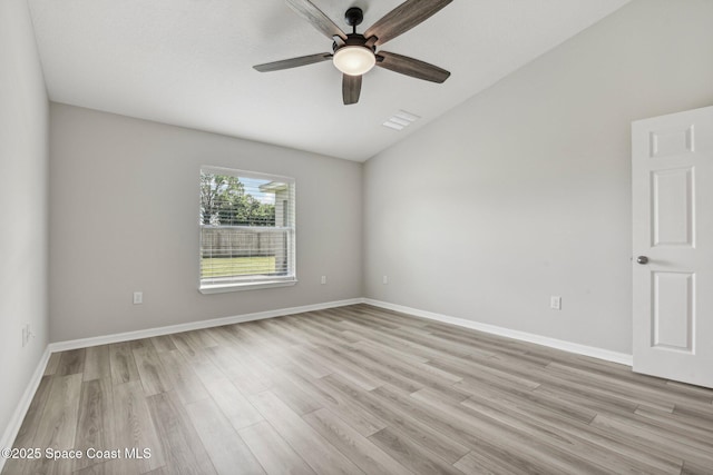 spare room with ceiling fan and light hardwood / wood-style floors