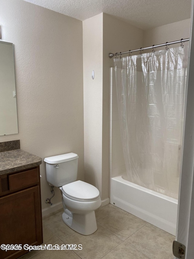 full bathroom with vanity, tile patterned floors, toilet, shower / bathtub combination with curtain, and a textured ceiling