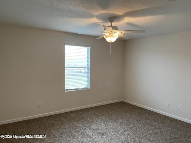 unfurnished room featuring carpet and ceiling fan