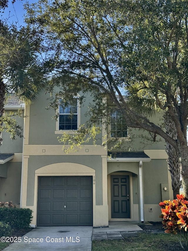 view of front of property featuring a garage