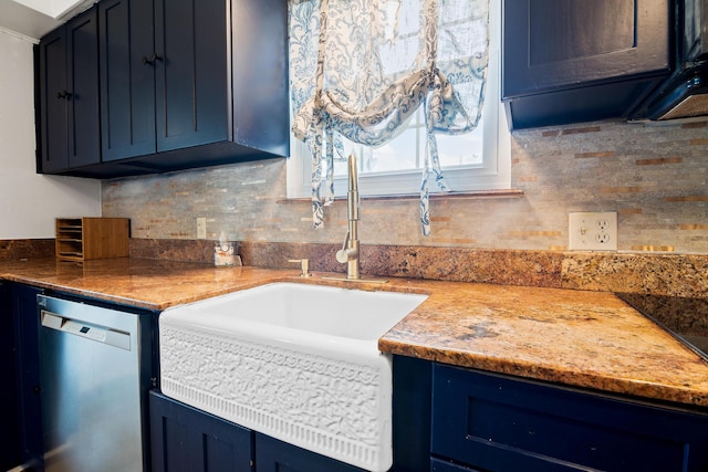 kitchen featuring backsplash, stainless steel dishwasher, blue cabinets, and sink