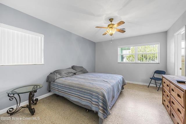 bedroom featuring ceiling fan