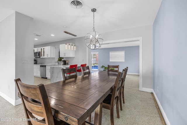 dining room featuring an inviting chandelier