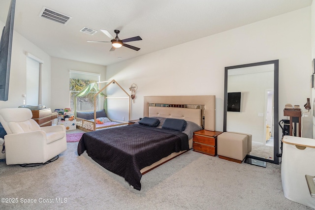 bedroom with light colored carpet and ceiling fan