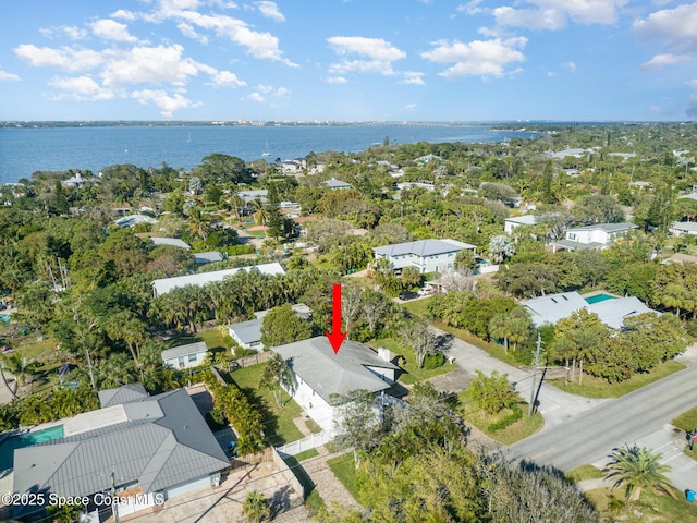 birds eye view of property featuring a water view