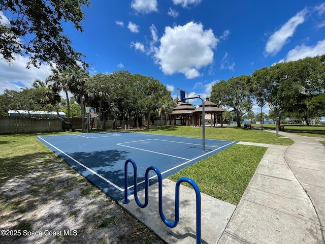 view of sport court with a gazebo and a yard