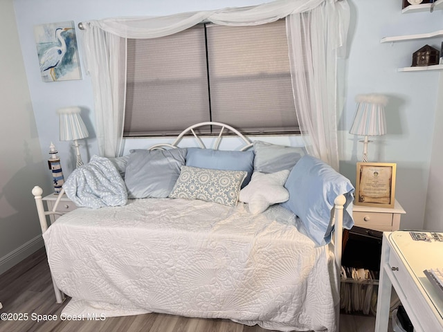 bedroom featuring hardwood / wood-style floors