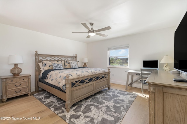 bedroom featuring light wood-type flooring and ceiling fan