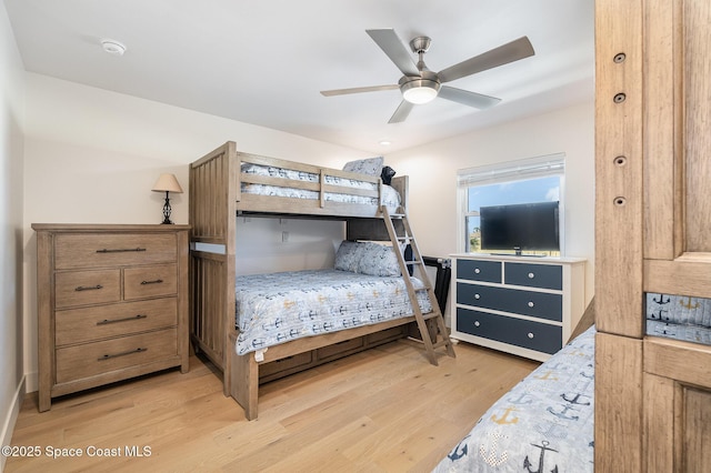 bedroom featuring light wood-type flooring and ceiling fan