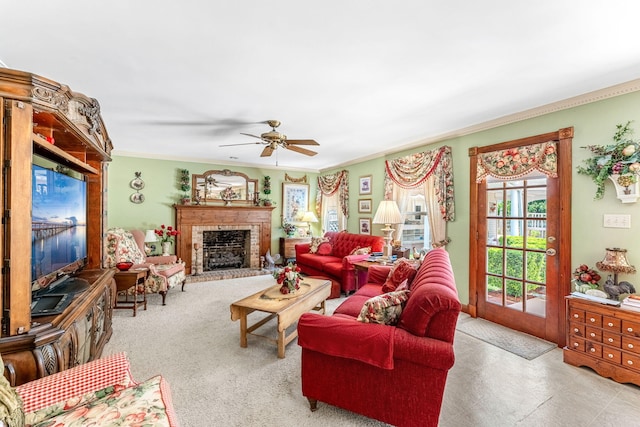 living room featuring crown molding and ceiling fan