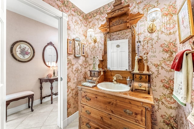 bathroom with tile patterned floors and vanity