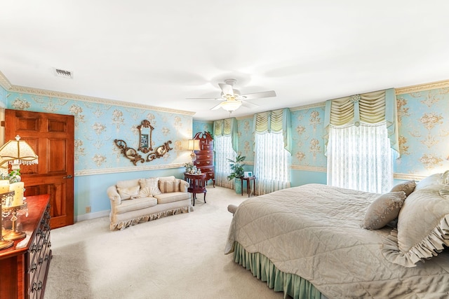 bedroom featuring ceiling fan and carpet floors