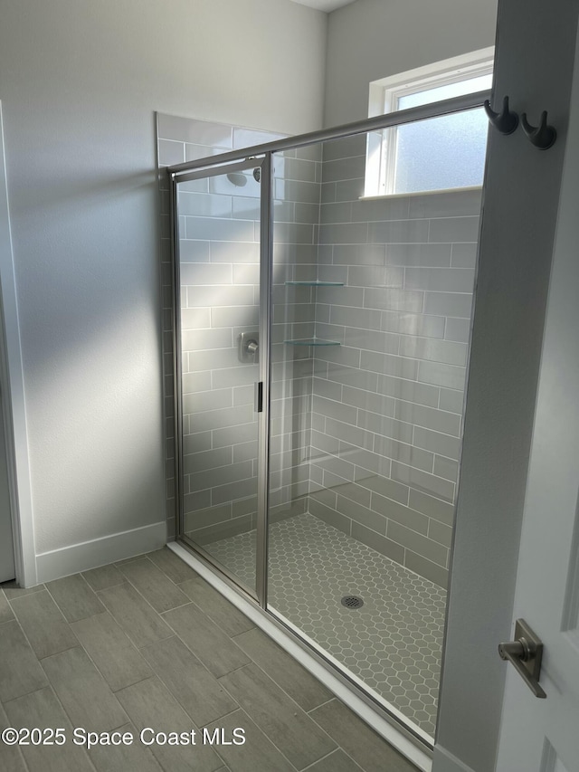 bathroom featuring an enclosed shower