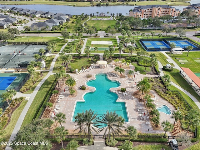 birds eye view of property featuring a water view