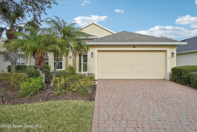 view of front of property with a garage