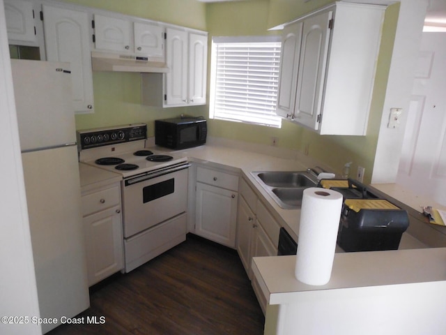 kitchen featuring white cabinetry, white appliances, and sink