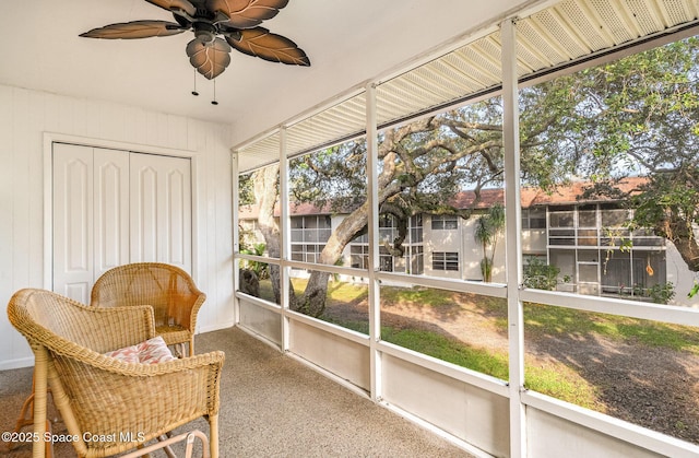 sunroom / solarium with ceiling fan