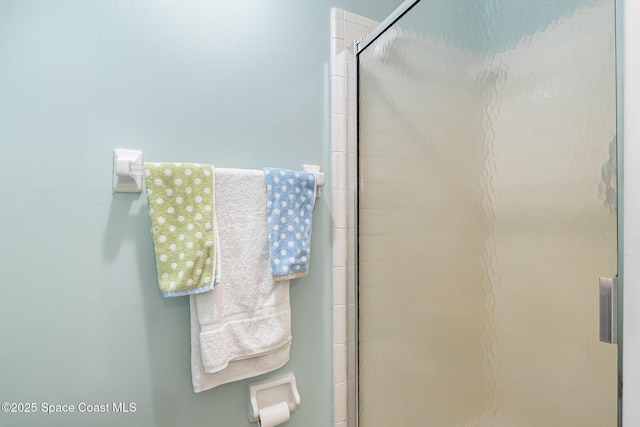 bathroom with an enclosed shower