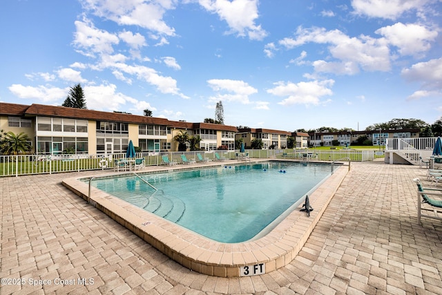 view of pool with a patio