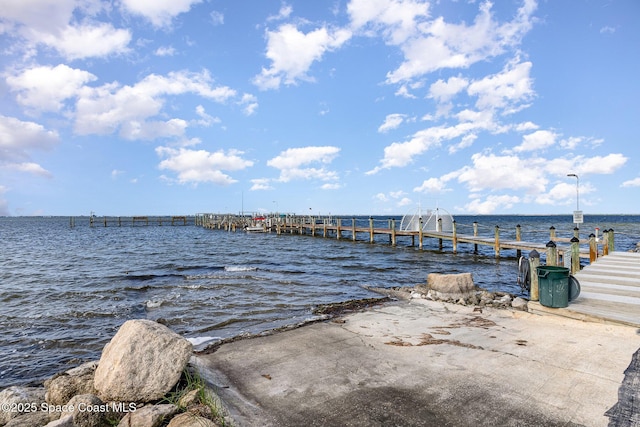 view of dock with a water view