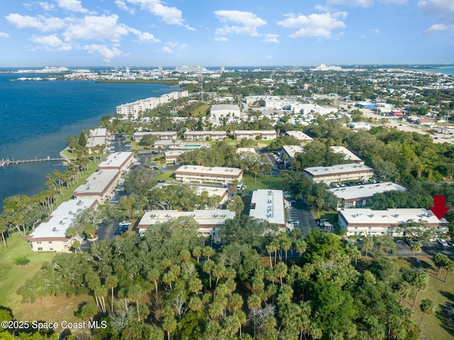 drone / aerial view with a water view