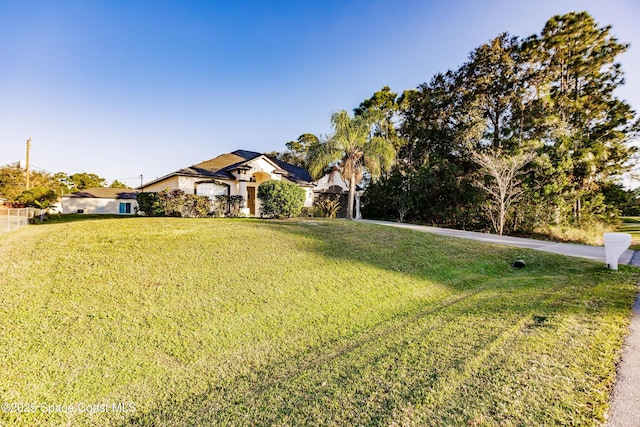 view of front of home with a front lawn