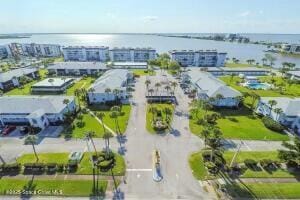 bird's eye view with a water view