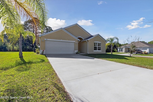 view of front of property featuring a garage and a front yard