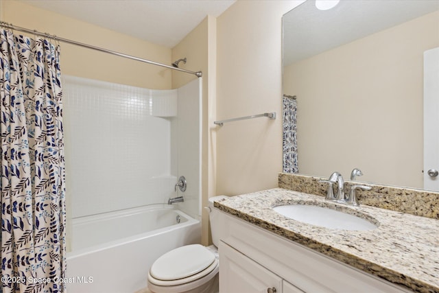 full bathroom with vanity, toilet, and shower / bath combo