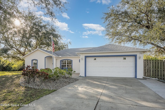 ranch-style house featuring a garage