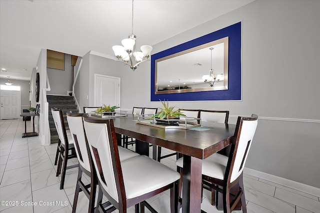 dining space with a chandelier