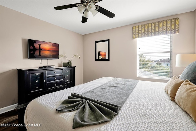 bedroom featuring ceiling fan and wood-type flooring