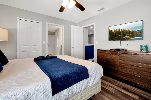 bedroom with ceiling fan and a closet