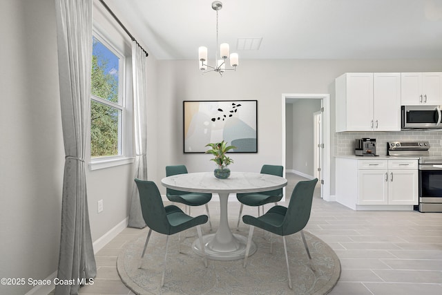 dining room with an inviting chandelier