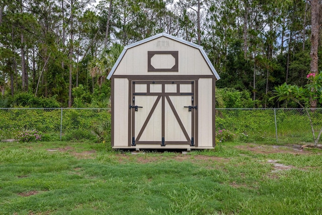 view of outdoor structure featuring a yard