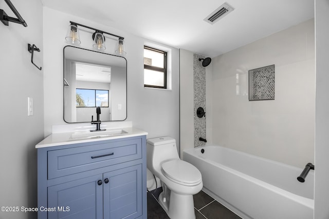 full bathroom with toilet, vanity, and tiled shower / bath combo