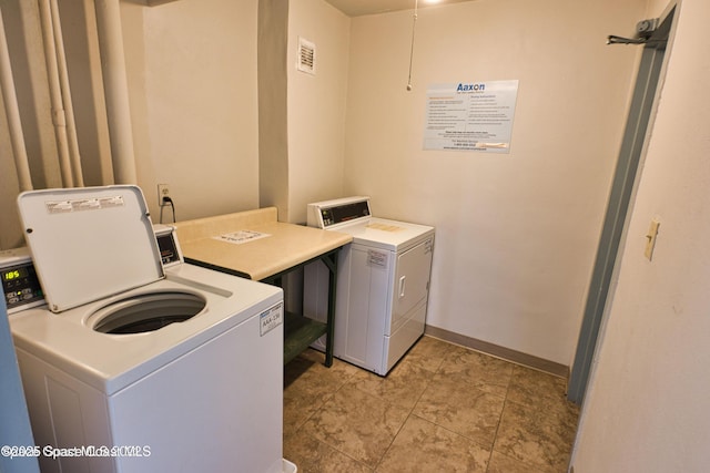 4700 Ocean Beach Blvd Unit 404, Cocoa Beach, FL 32931 - community laundry room with washer and dryer