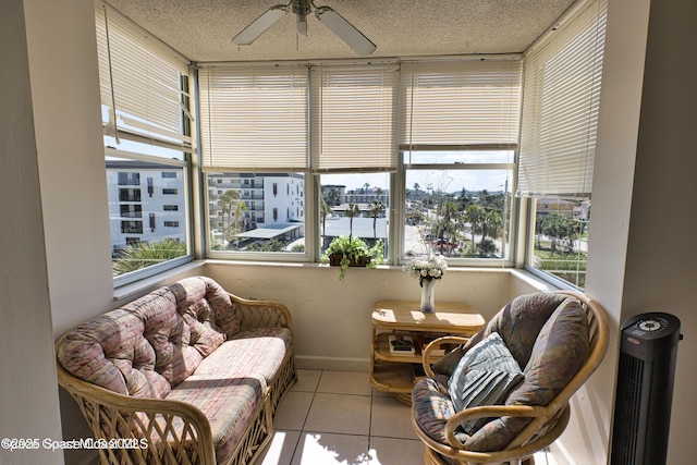 sunroom with ceiling fan