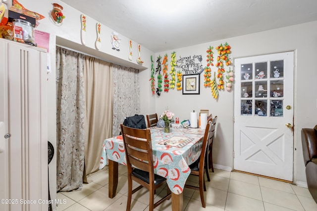 view of tiled dining space