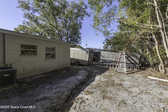 view of yard with cooling unit